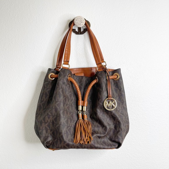 Michael Kors Handbags - Michael Kors Brown Monogram Drawstring Shoulder Bag with Leather Tassels Gold HW